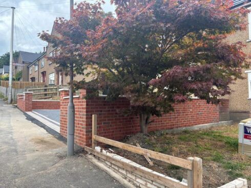 block paved driveway with brick wall nelson 02