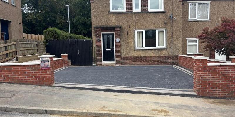 block paved driveway with brick wall nelson 09