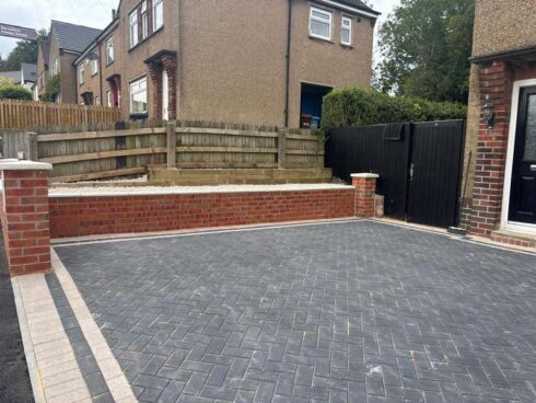 block paved driveway with brick wall nelson 14