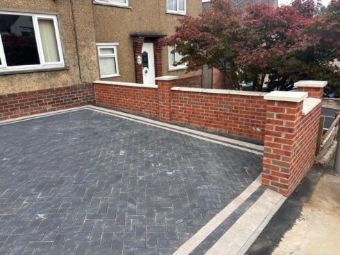 block paved driveway with brick wall nelson 15