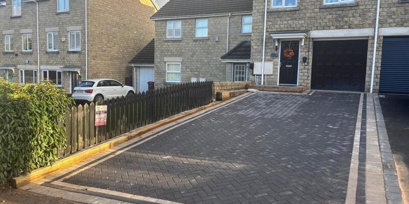 charcoal block paved driveway with lighter grey border in accrington lancashire 6
